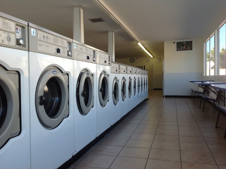 ECP Coin Laundry El Monte - Row of Commercial Washing Machines with Folding Area