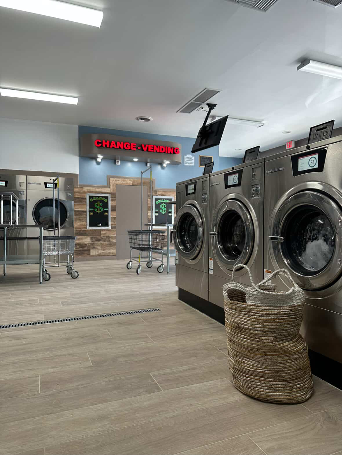 ECP Coin Laundry Arcadia Interior - Modern Speed Queen Washing Machines and Change Station